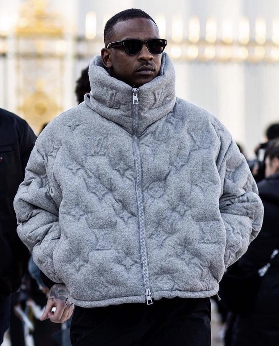Skepta in Louis Vuitton FW19 “boyhood” Monogram Puffer Coat