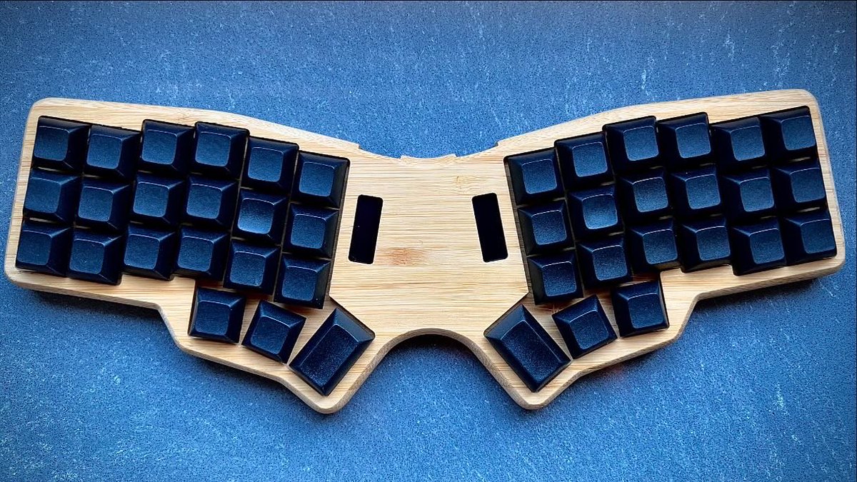 🌟 Introducing the #Corne joined  #Keyboard!

Check out our new connected, #ergonomic wooden design, perfect for #coding and gaming. Wired & wireless options available. Upgrade your setup today! 🦋💻

#MechanicalKeyboard #TechGadgets #py #keeb 
#KEEB_PD #atreus #NewRelease #WFH