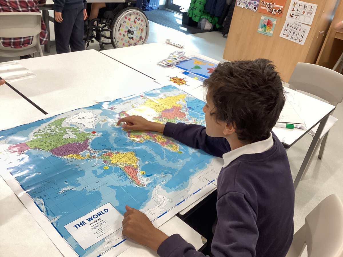 Orchards_School's tweet image. Woodland 5 have been using compass points to describe the location of smiley faces on a map. They gave each other directions like 'south of South Africa' #communication #geography #mapskills