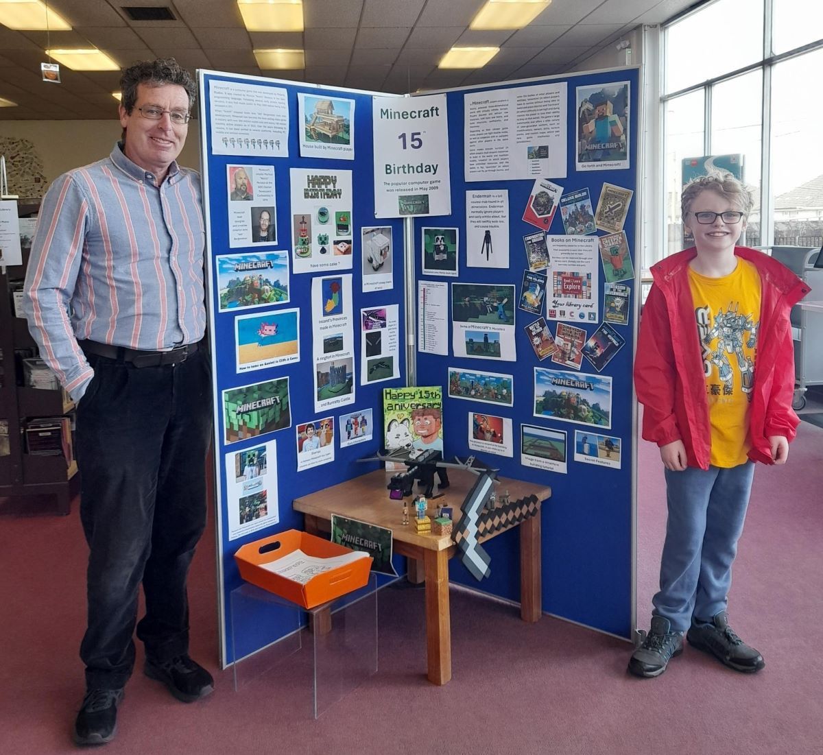 Cathal O’Farrell, aged 11, checks out the Minecraft tribute currently running at Mayfield Library. The massively popular children’s computer game is 15 years old this month, and books on the game are some of the most popularly requested at Mayfield. 🙂👍