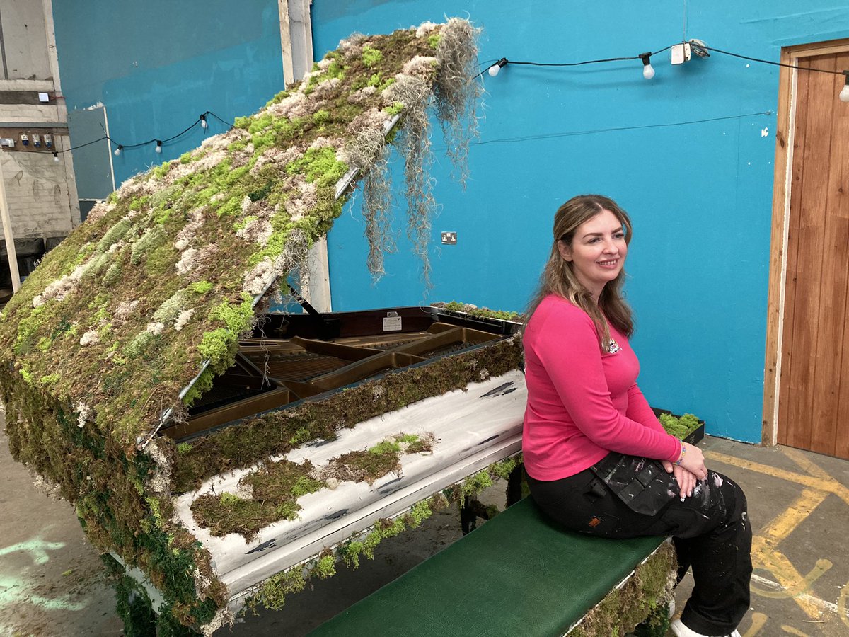 An Evermore inspired grand piano covered in moss will be one of 11 installations on the Taylor Trail created for @taylorswift13 forthcoming #LiverpoolTSTheErasTour. Artist Rachel Smith-Evans based @makeCIC created the installation. Hear more on Drive with @beezoradio
