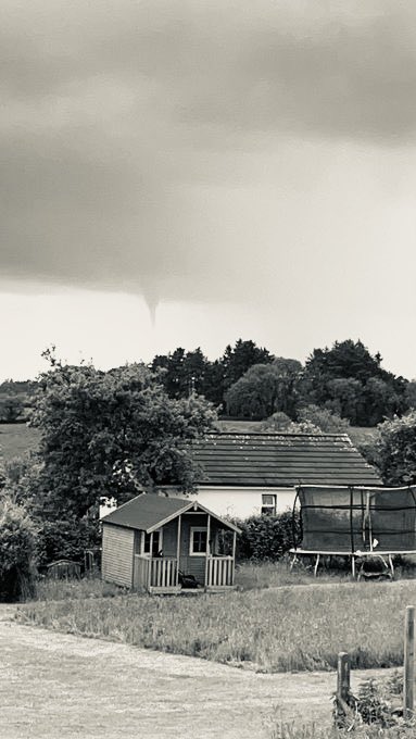 clionasweeney's tweet photo. @silyld @CorkSafetyAlert @CarlowWeather @MetEireann That little house totally giving it Kansas vibes, the trampoline is off to Oz any minute now #MiniTwister #WestCorkTwister #Tornado #OffToOz #WeatherWatch #Ireland https://t.co/VIeUe7NgSN
