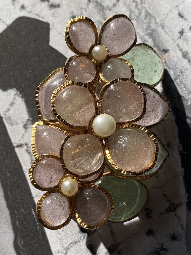 this Chanel vintage Gripoix Floral brooch Pendant is soooo pretty