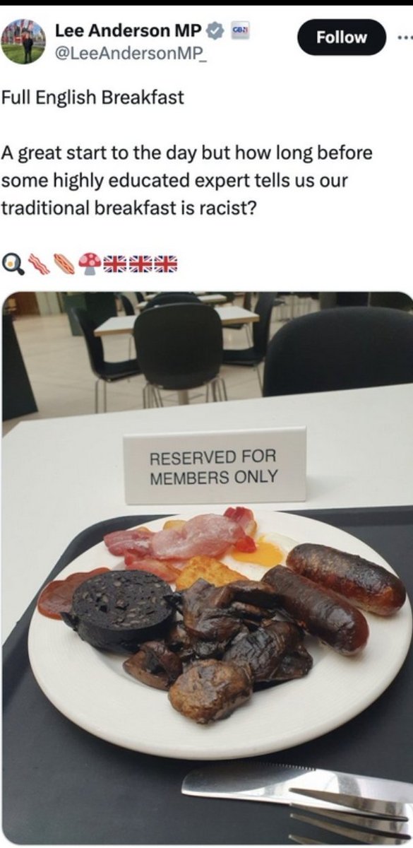 Sausages look burnt, bacon looks like it was microwaved from frozen, egg there in spirit only, whole thing is 60% mushroom. And whi the fuck puts tomato sauce on the plate edge like that. Not racist but certainly a crime. #racistbreakfast #30plee