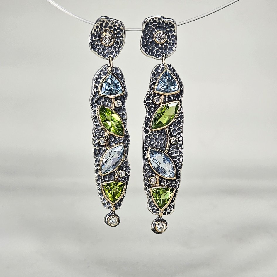 #Peridot, #aquamarine & #diamond bezel-set in 22k #yellowgold pop off these #sterlingsilver textured statement #earrings. 

Designed by #KatherineSpencerStudio. 
Want to create something special? Ask a DESIGNER: bit.ly/AskSpencerAndK… #spencerandkuehn #morgantown #westvirginia