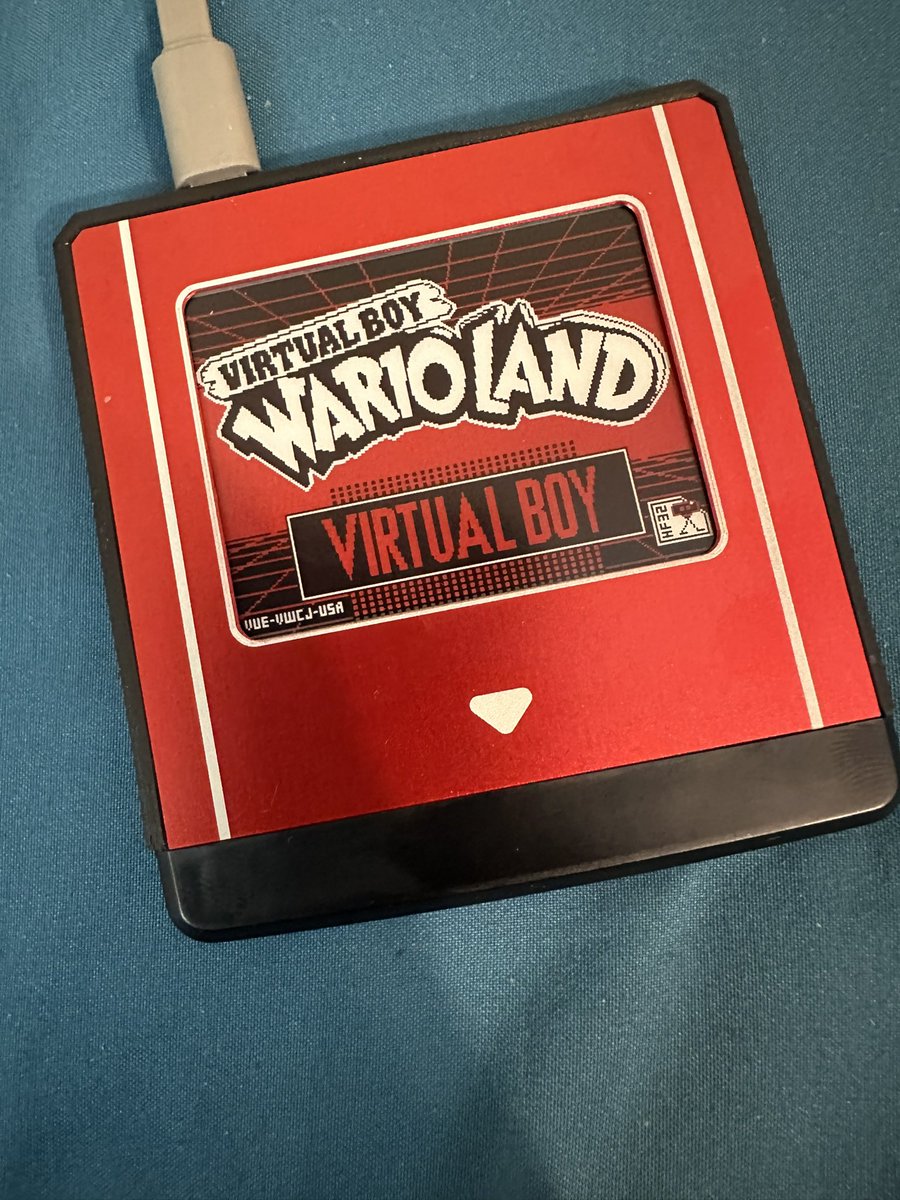 UnicityPoint's tweet image. Awesome new piece of retro tech came in the mail 😍 a Hyperflash32, a multi game flash cart for the Nintendo Virtual Boy with an eInk display that doubles as a menu and label