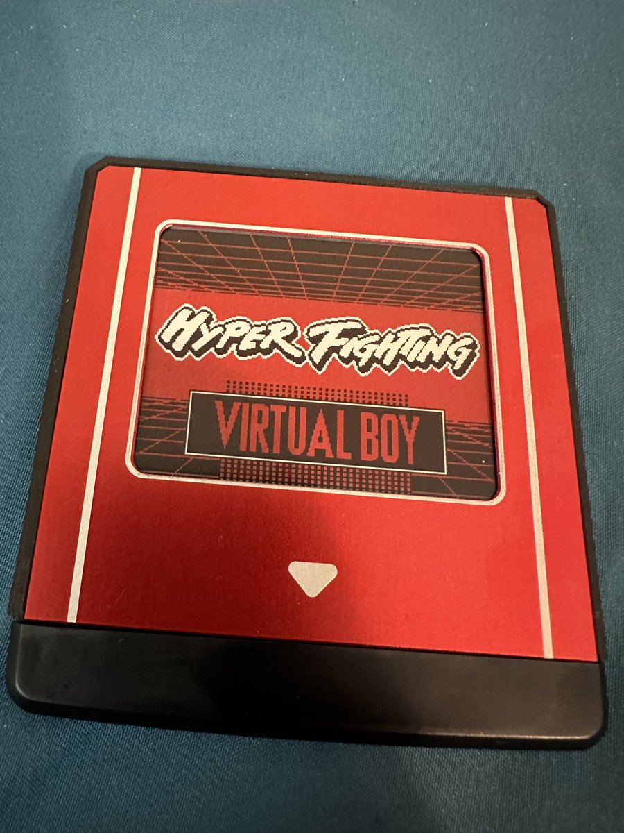 UnicityPoint's tweet image. Awesome new piece of retro tech came in the mail 😍 a Hyperflash32, a multi game flash cart for the Nintendo Virtual Boy with an eInk display that doubles as a menu and label