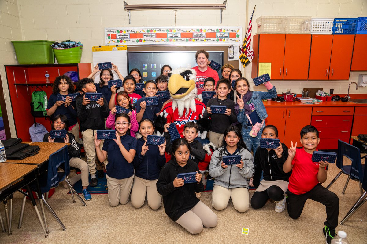 Congrats to students from @PGCPS_RES for completing the Caps in School Reading Program, presented by @KPMGThrive! These bookworms were treated to a surprise visit from @Caps_Slapshot and a @PapaJohns_DMV pizza party. #ALLCAPS