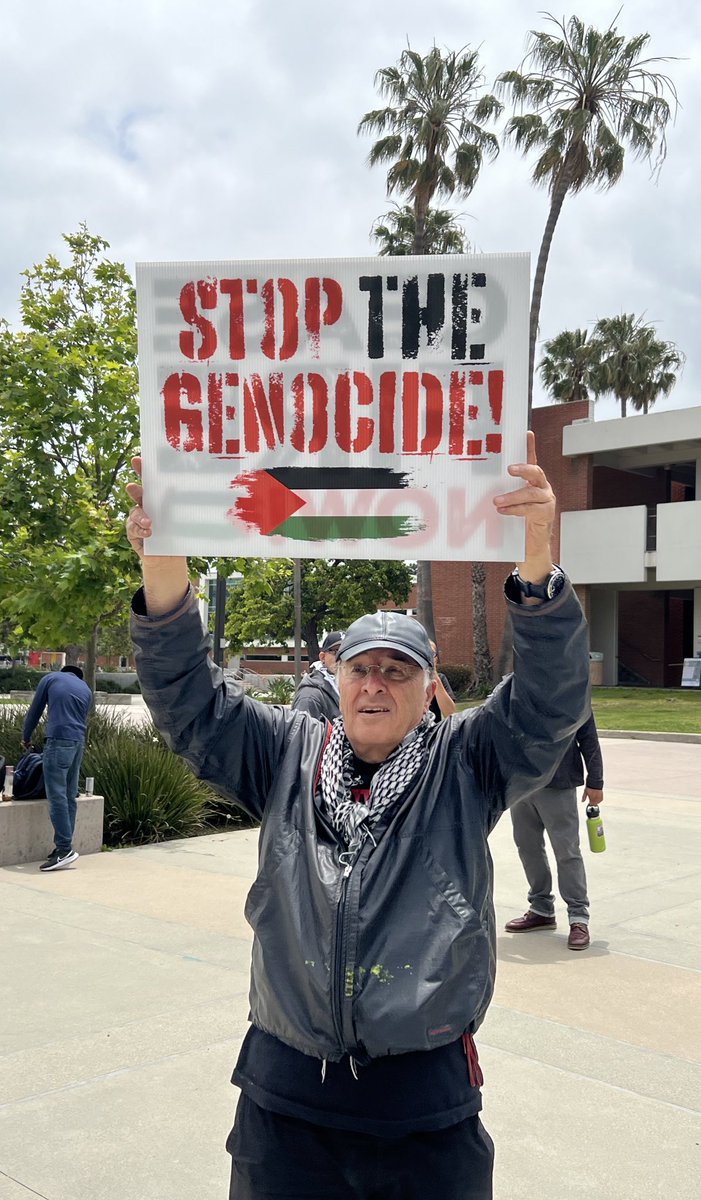 Art History Professor Ali Ahmadpour holds a sign demanding a stop to the genocide that is ongoing on Palestine. Ahmadpour has been at teacher at El Camino for 20 years and has been apart of multiple demonstrations on campus. #eccunion #elcaminocollege
