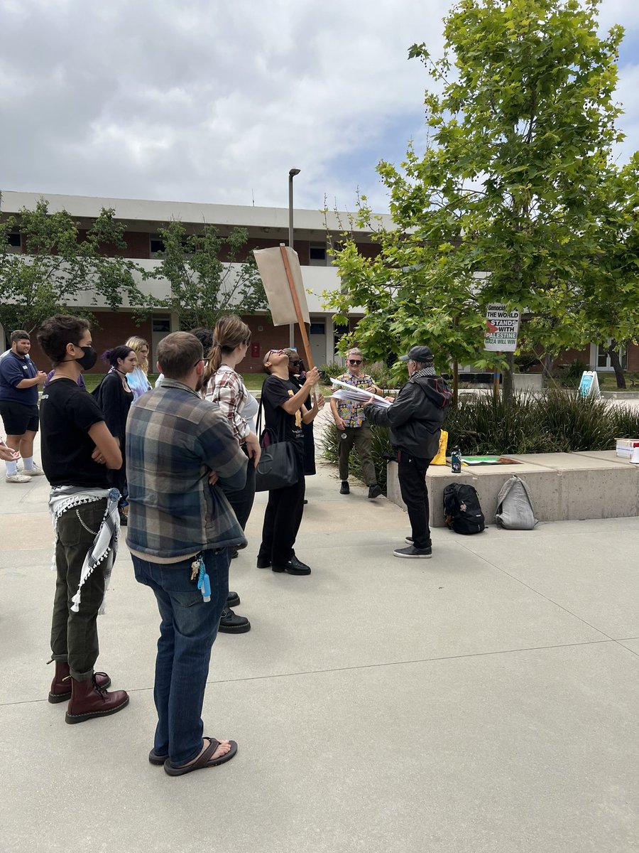 Demonstrators gather signs at the student-led Teach In for Palestine at El Camino College. #eccunion #elcaminocollege