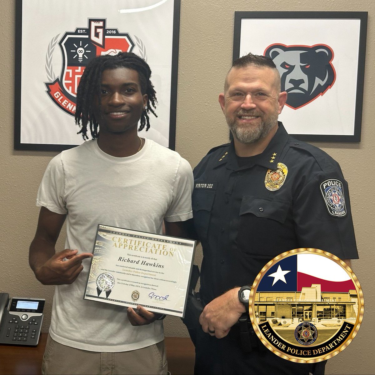 Chief Minton went to Glenn High School today to present Richard Hawkins, a 12-grade student, with a Chief's Coin and a certificate for providing aid to a seriously injured passenger after a recent traffic collision. Well deserved!