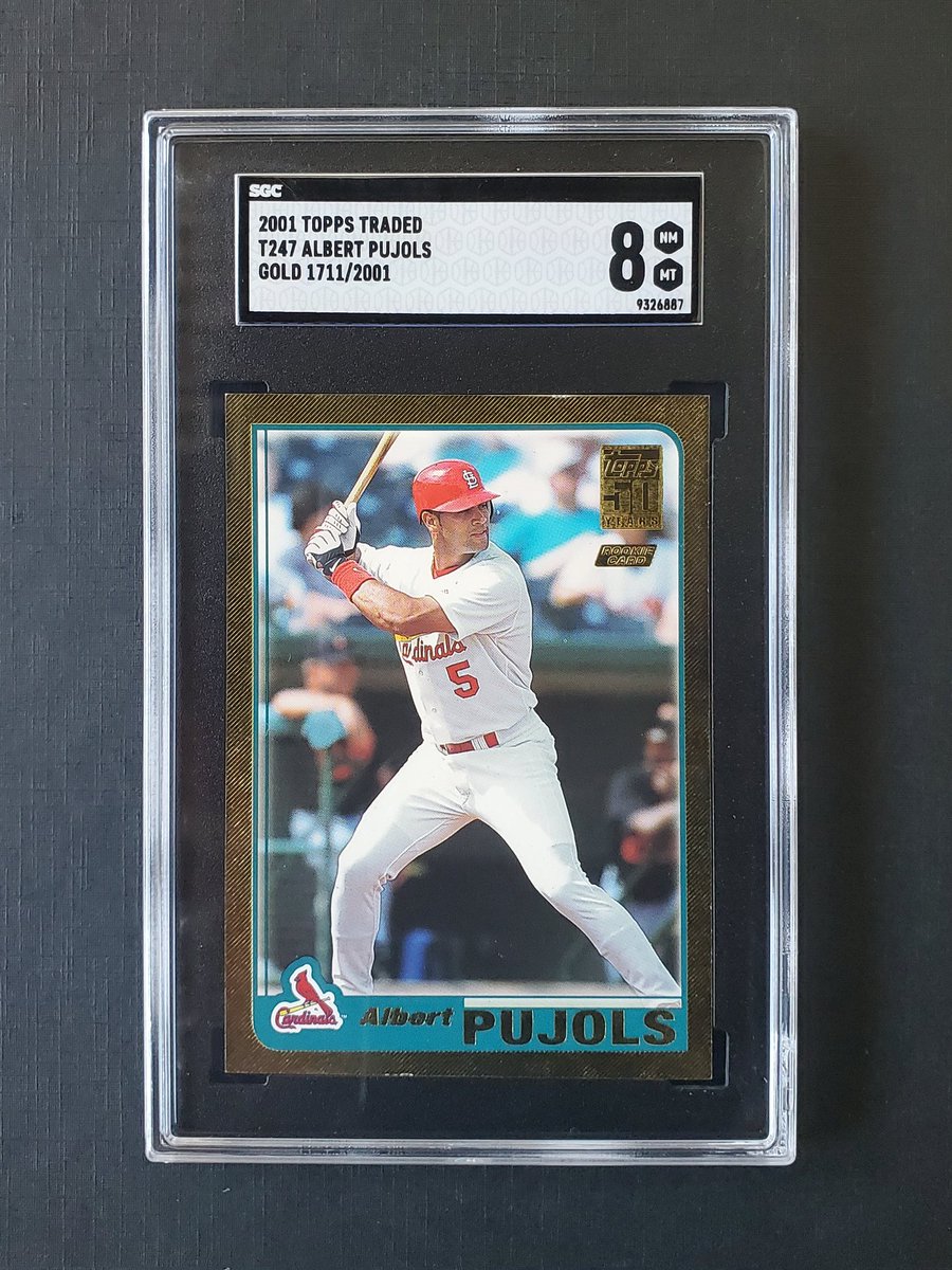 Pains me to sell it but furnishing a new apartment and card room takes precedent:

Pujols RC Gold /2001 $750 ppff. No trades.