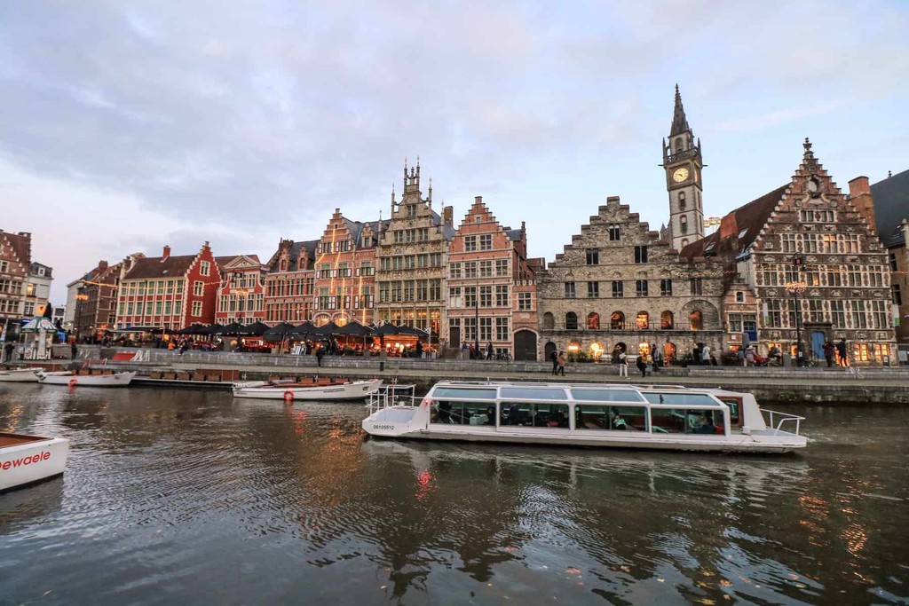 Besides taking a stroll along the canals, one of the best things to do in Ghent is to experience the city on a canal boat ride... Read the full article: 21 Amazing Things To Do In Ghent, Belgium For First Time Visitors 2023 ▸ bit.ly/47xzWmO #Ghent #Belgium #Europe