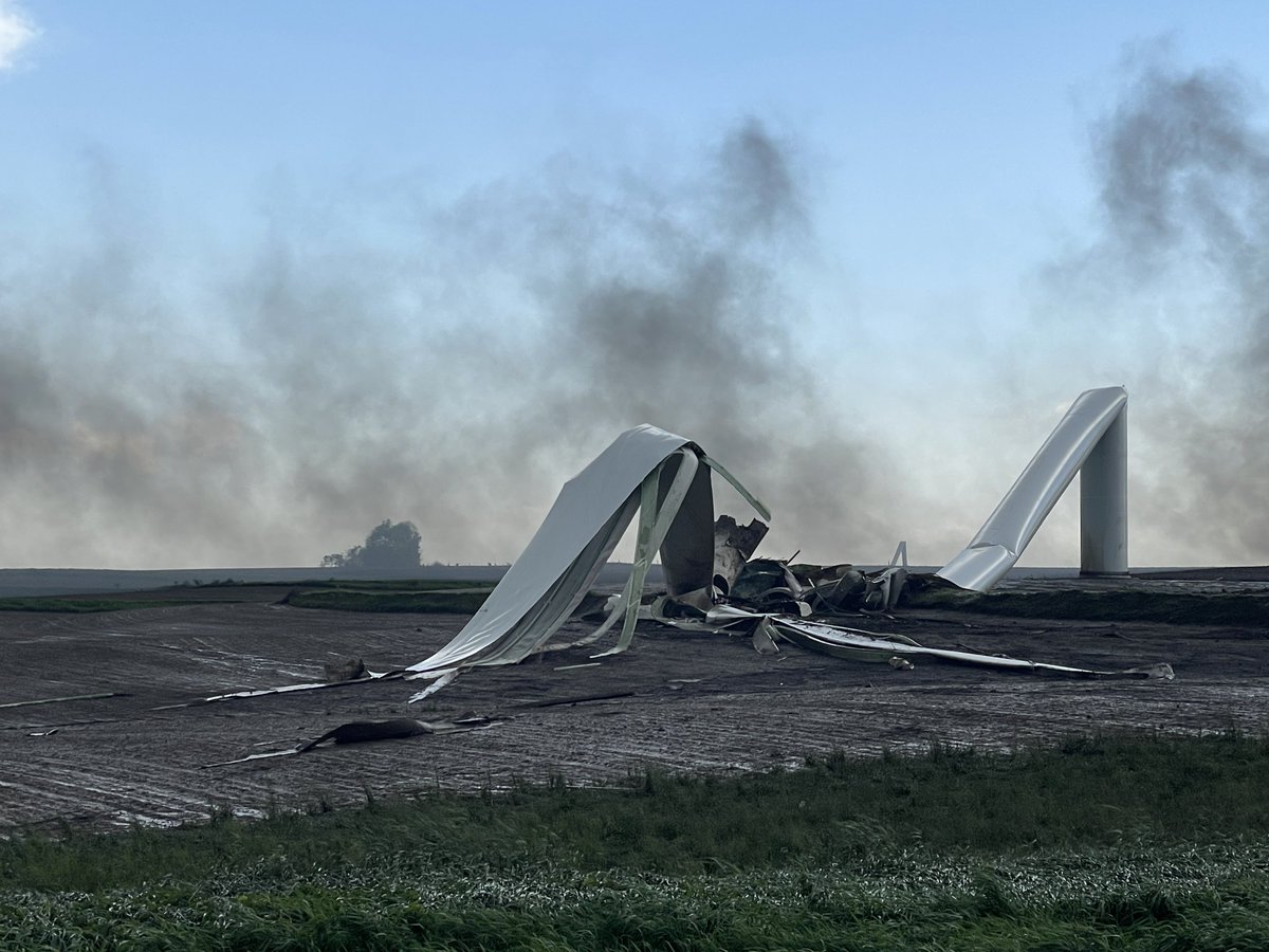 Apocalyptic scenes between Carbon and Greenfield, Iowa. Multiple wind turbines completely shredded, one on fire, power pole stumps left behind with entire poles gone. Strong strong tornado.