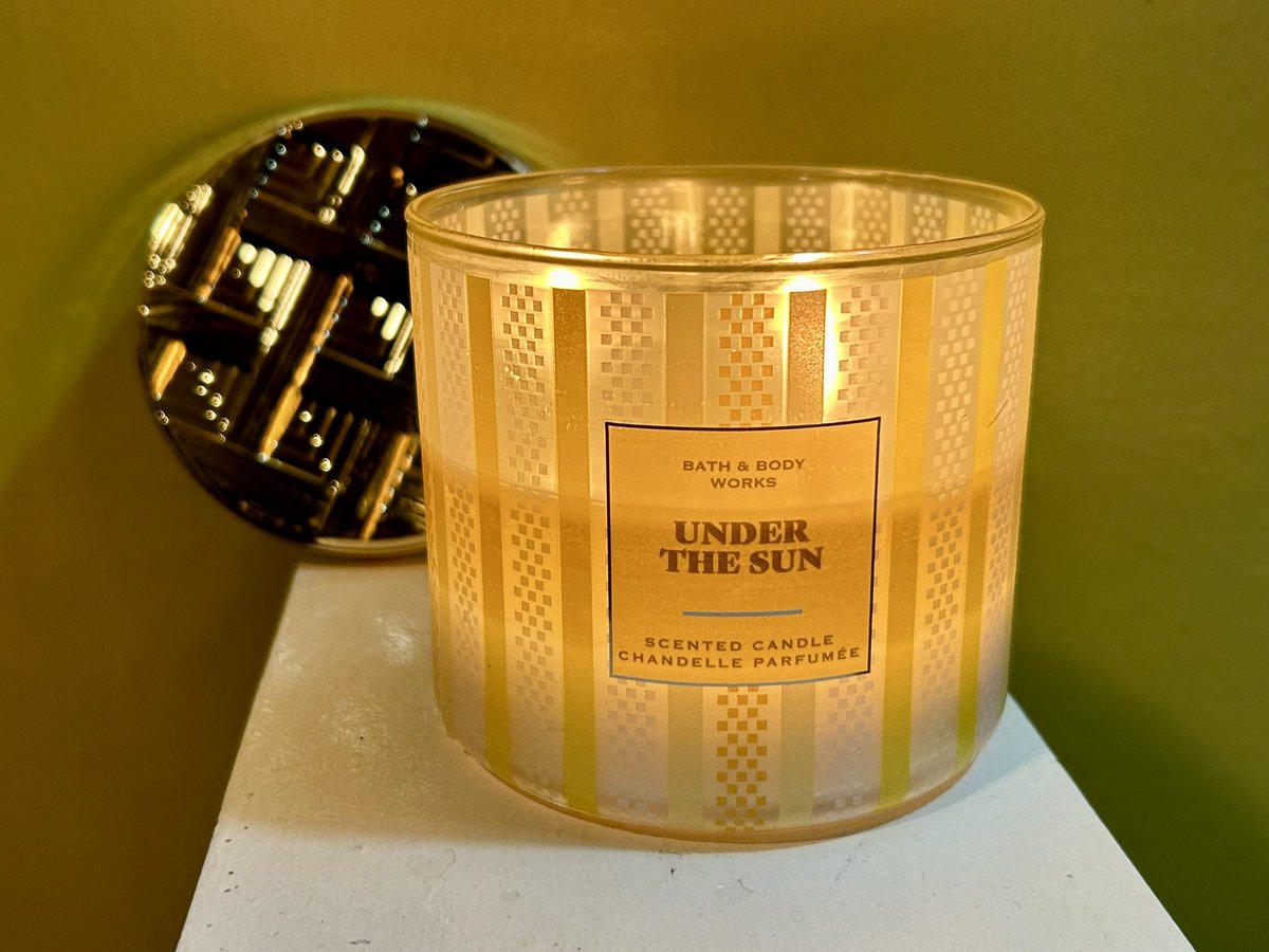 I have an “Under the Sun” scented candle (“a fruity, floral slice of paradise” … sweet coconut, sunny banana and warm jasmine) from @bathbodyworks Canada burning. The coconut scent is coming through and it has a strong throw. #candle #scentedcandle #coconut #banana #jasmine