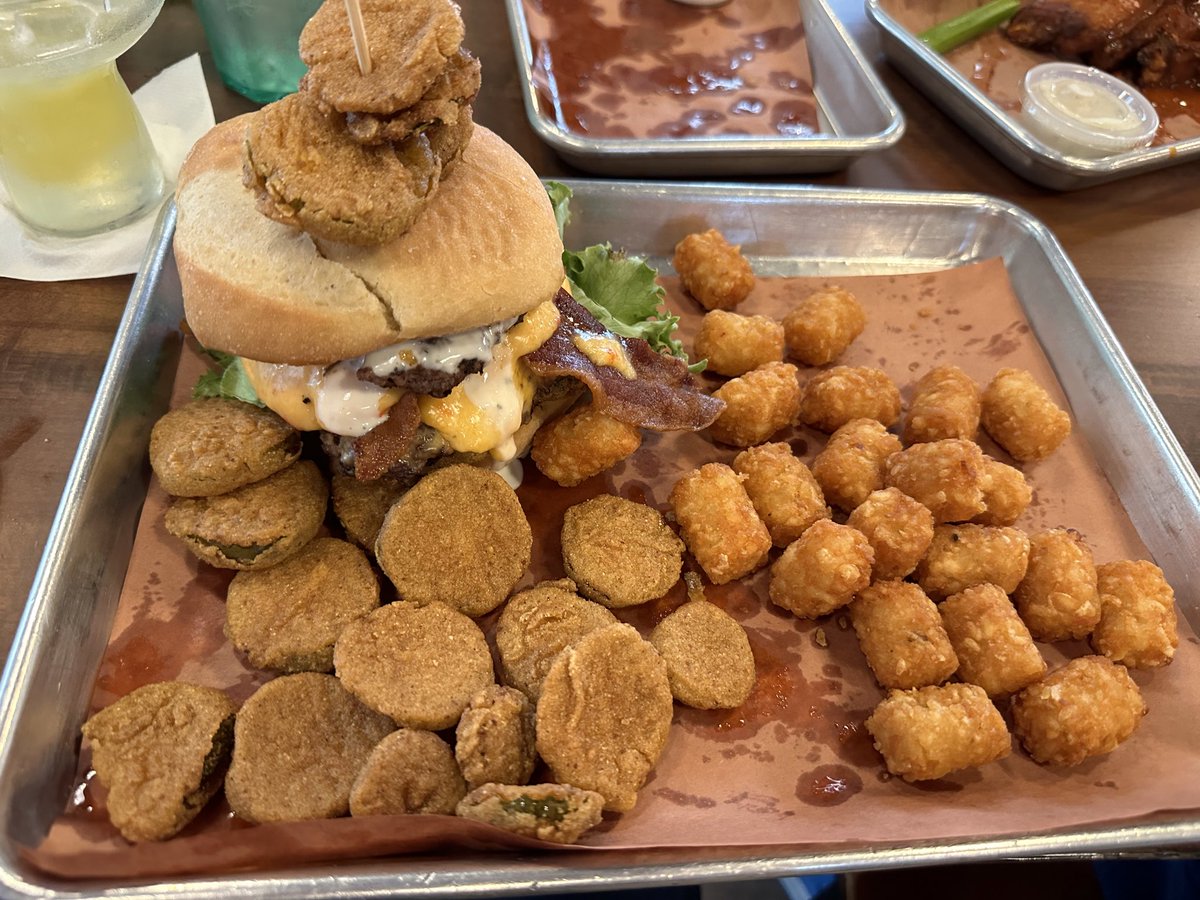 Cheers from Split Rail Eats on Glades Road in Gatlinburg. First time here. Margaritas and Pickle Me Pimento Burger. It’s made with two patties, pimento cheese, bacon, lettuce, tomato, a whole order of fried pickles, tater tots  plus ranch dressing. 👍🏻👍🏻