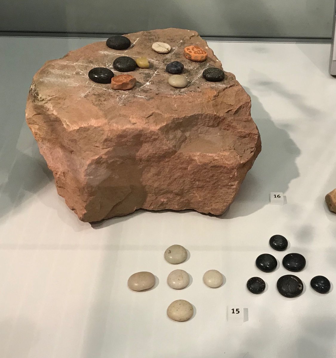 Some glass and pottery Roman gaming pieces, which were all found at #Trimontium, in the #ScottishBorders, dating to AD80-180. A favourite game played by soldiers was latrunculi (robbers) - like modern draughts & chess with different types of pieces that were moved around a board.