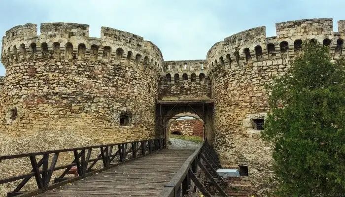 Overlooking the confluence of the Danube and Sava rivers,, the Belgrade Fortress is situated on a tall ridge. It is one of the most prominent tourist places to visit in Belgrade. -SAVEATRAIN.COM