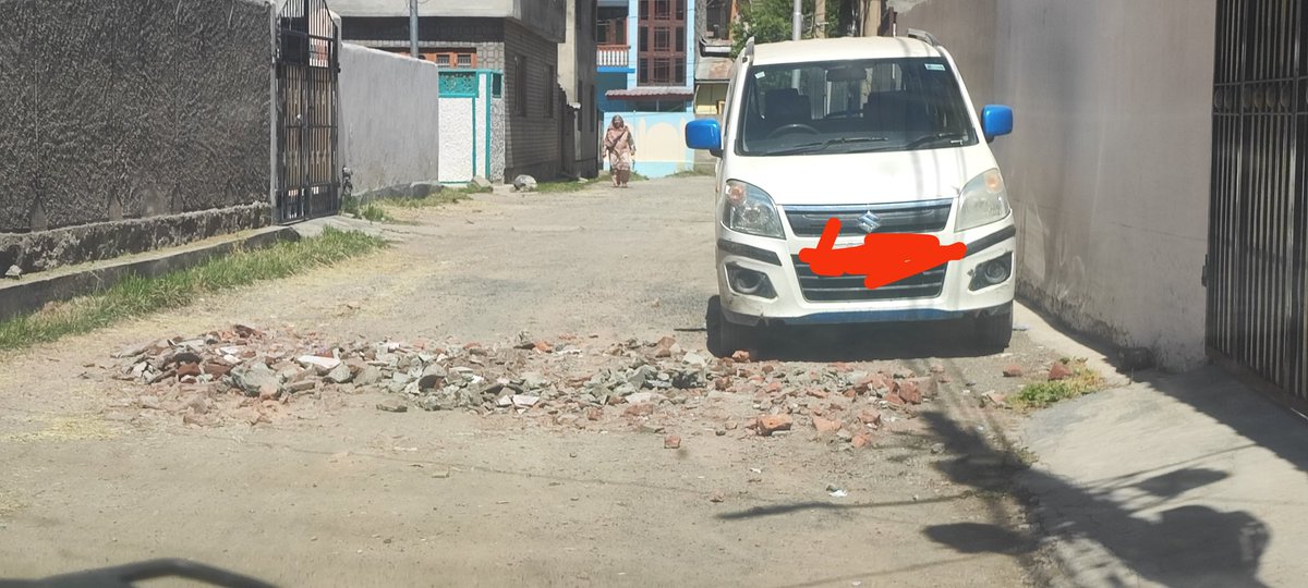 Awsaf_awi's tweet photo. @SMC_Srinagar @OfficeOfLGJandK @JKHUDD1 @DivComKash @owais_ias @diprjk @ddnewsSrinagar @ddprsrinagar @SMC_24x7 @works_smc This is the situation of roads in baghi-mehtab govt housing colony, SMC workers take money from people who have construction undergoing in their homes then they dump their waste material on the roads in potholes https://t.co/BKOyLJli7y