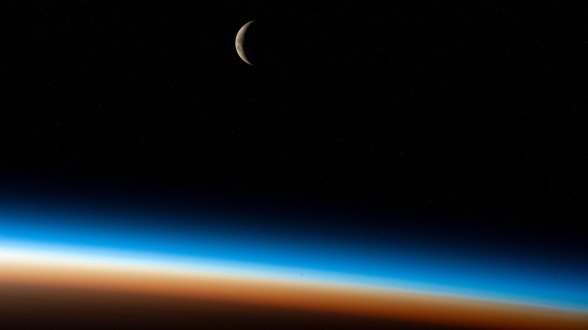 The Moon and the Earth’s atmosphere from space