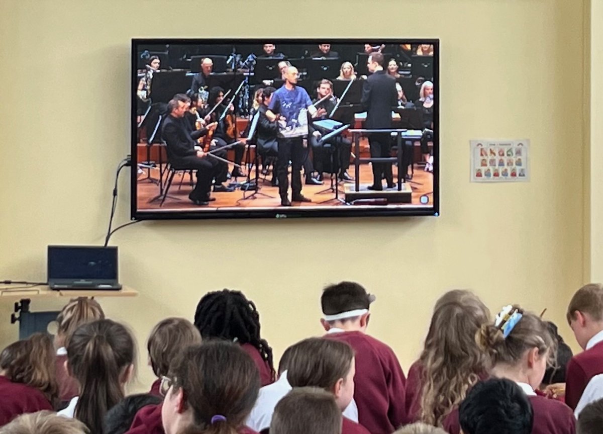 KS2 enjoying a live stream of the Bournemouth Symphony Orchestra from the Poole Lighthouse Theatre.