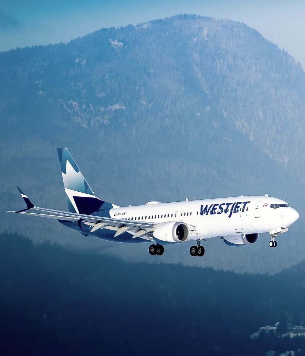 Blue bird day. ✈️ 🏔️ #WestJet #737 📸 @DMairplane