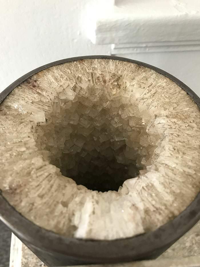 Waterpipe encrusted with years of groundwater salt