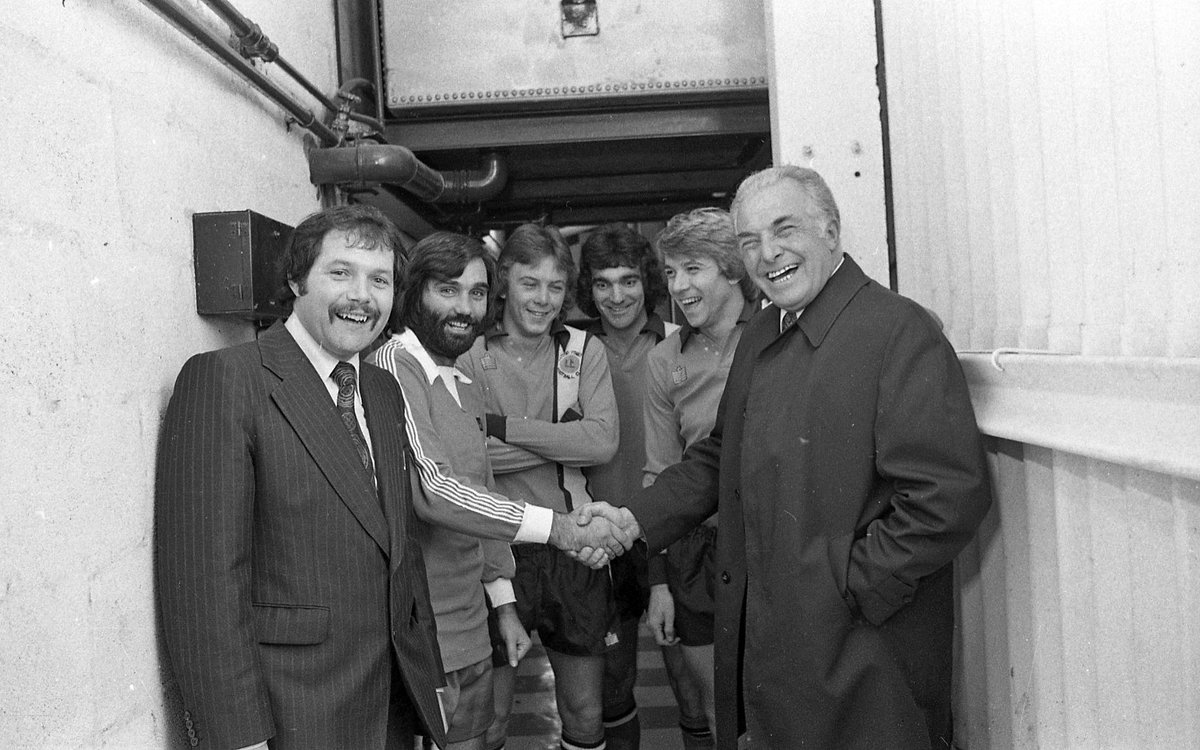 George Best, who would have been 78 today, pictured before he played for @DunstableTownFC v @LutonTown at Dunstable's Creasey Park, mid 70s. L to r: Dunstable manager Barry Fry, George Best, Hatters players Andy King, Peter Anderson and Alan West, and Luton manager Harry Haslam.
