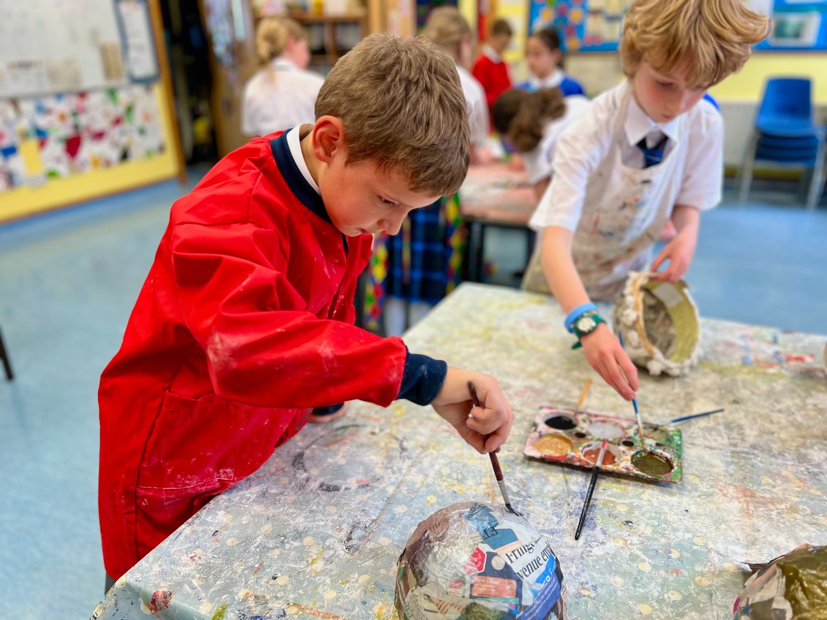 Craigclowan's tweet photo. As part of their Viking topic, #CraigclowanForm4 are transforming their papier-mâché helmets and getting creative. 🔨🎨 Aprons tried their best, but the shirts took one for the team!🖌️
#CraigclowanJuniors #TopicWork #CraigclowanJuniors #TopicWork https://t.co/KhNGtWfXH4