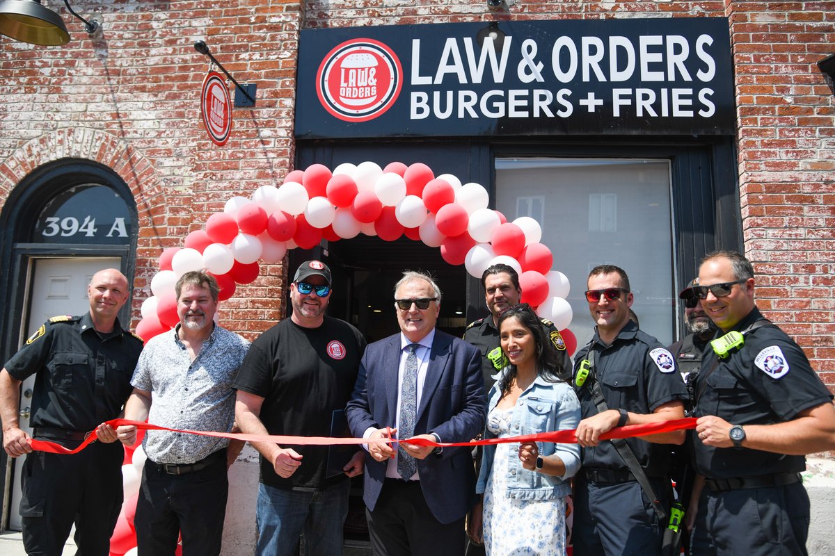 Community | Law & Orders Burgers & Fries is now open downtown! Today, Mayor Ellis, @BellevilleFire and @BLVLPolice were pleased to join owner Jamie Law to celebrate the grand opening. They are located in the north end of downtown in the newly renovated heritage building at 394