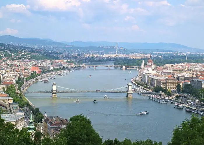 A gemstone of #Budapest, the hill rises above skyline of Buda providing with spectacular bird’s eyes views of the historical city. The #Gellert-Hill Cave and the skyline make it one of the must places to visit in Budapest. -SAVEATRAIN.COM