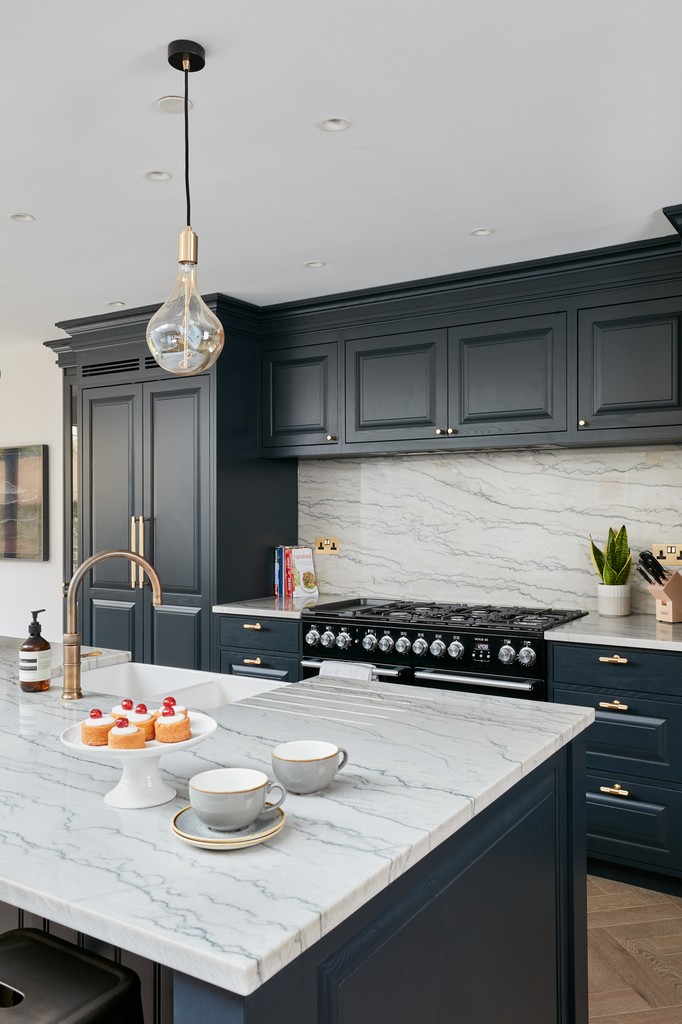 Sophisticated inky blue cabinetry combined with the charm of natural stone worktops and contrasting brass handles embody the classic style envisioned by our clients. #classickitchens #bespokekitchens #scandikitchens l8r.it/4Uqw