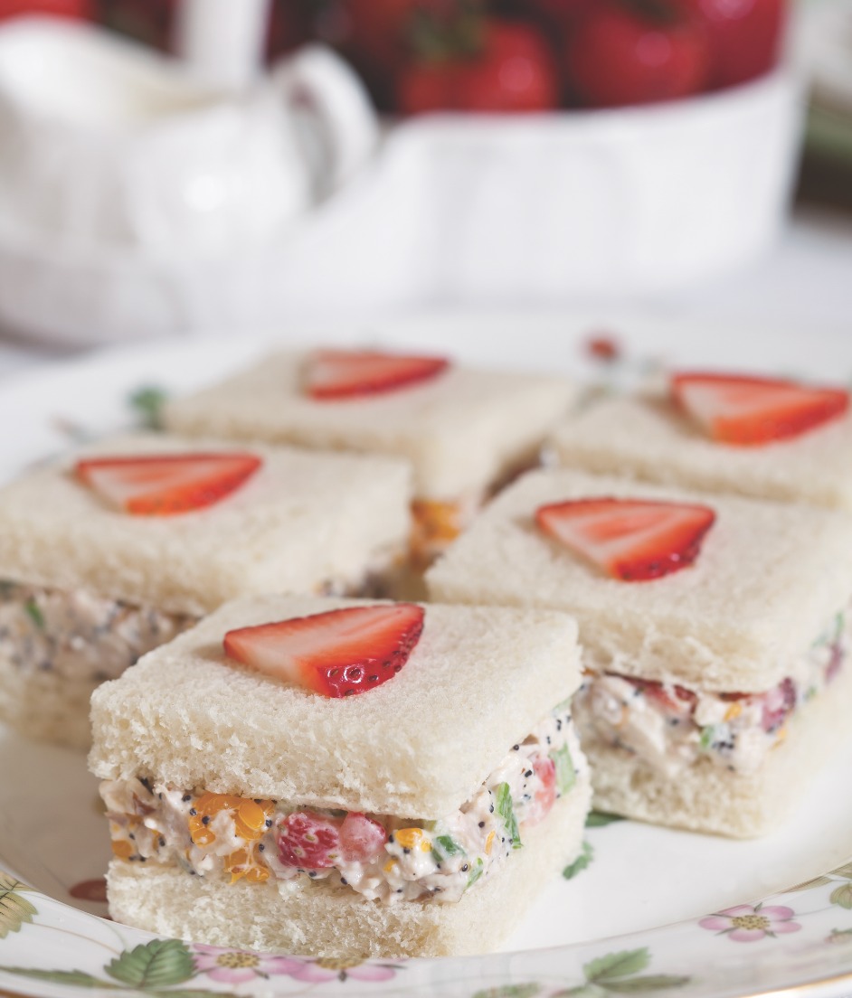 These delicious Strawberry-Chicken Salad Tea Sandwiches are sure to delight guests at your next tea gathering. Fresh strawberries and mandarin oranges add a touch of sweetness to this traditional teatime savory. Find the recipe at teatimemagazine.com/strawberry-chi….