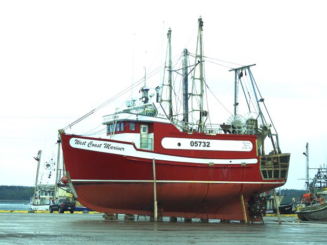 For comparative purposes just have a look at the pick up truck at the front of this fishing boat. When in the water these boats all look much smaller than they really are.