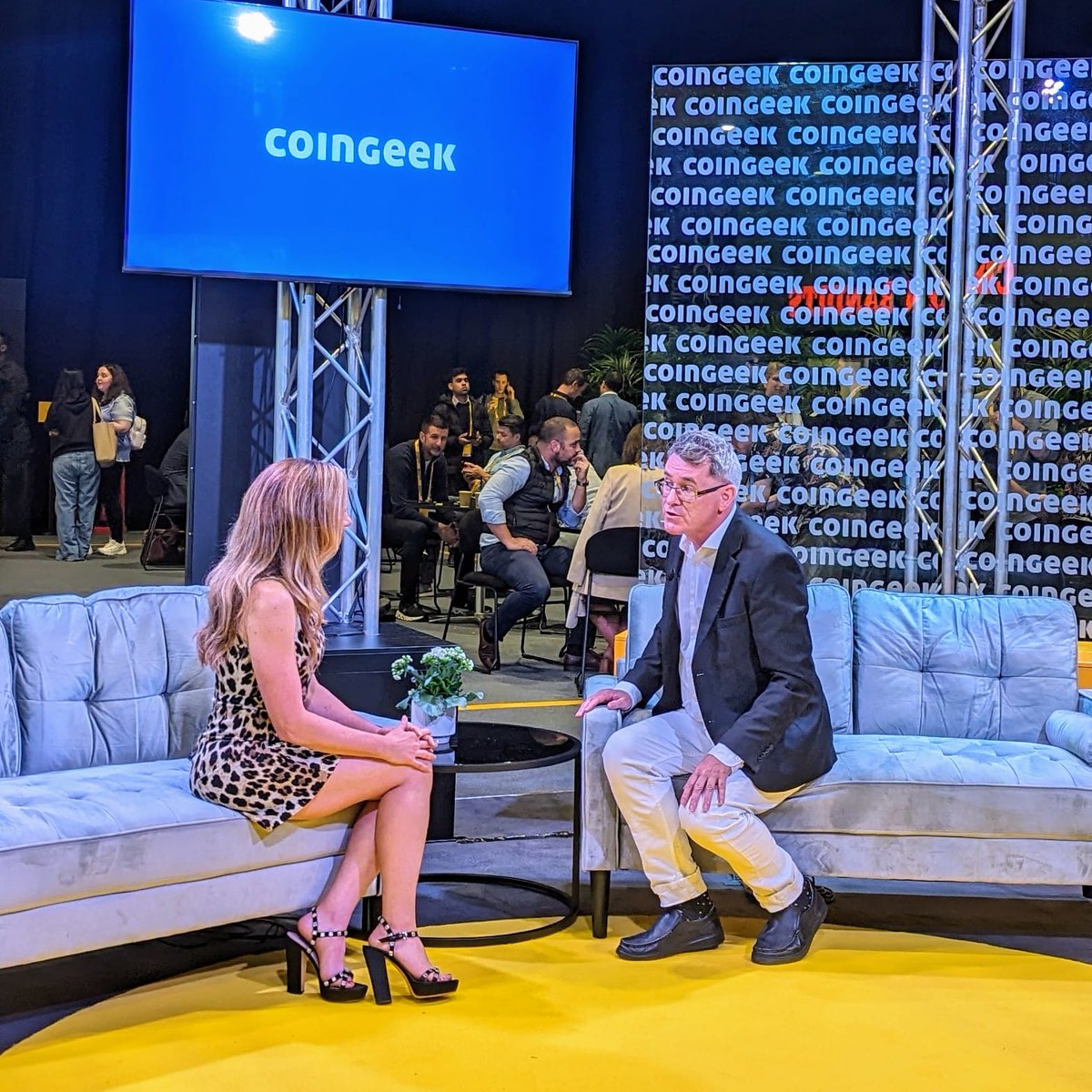 On the CoinGeek couch with @rebeccaLiggero is Ian Grigg from @p2p_foundation