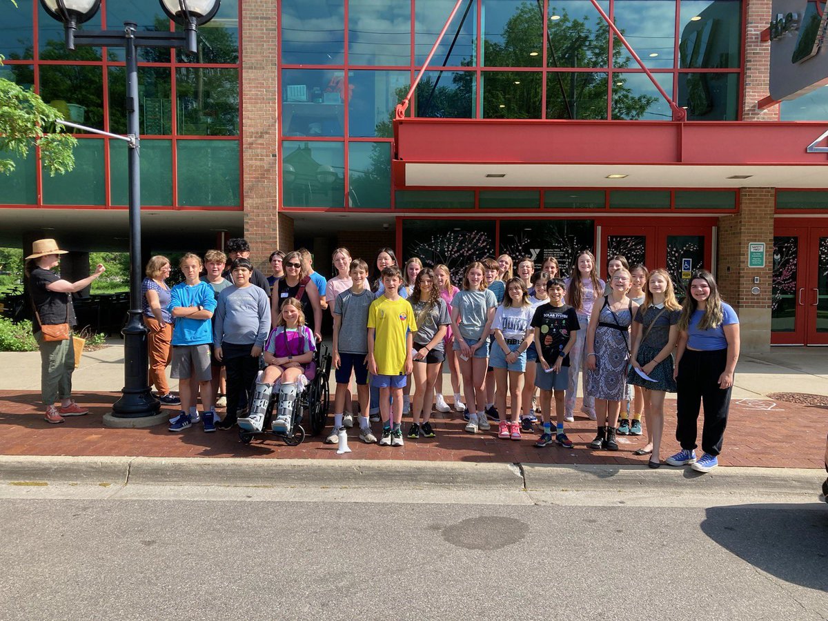 7th grade Spanish Slauson students getting ready for a scavenger hunt in downtown Ann Arbor, practicing their directional vocabulary out in the community.