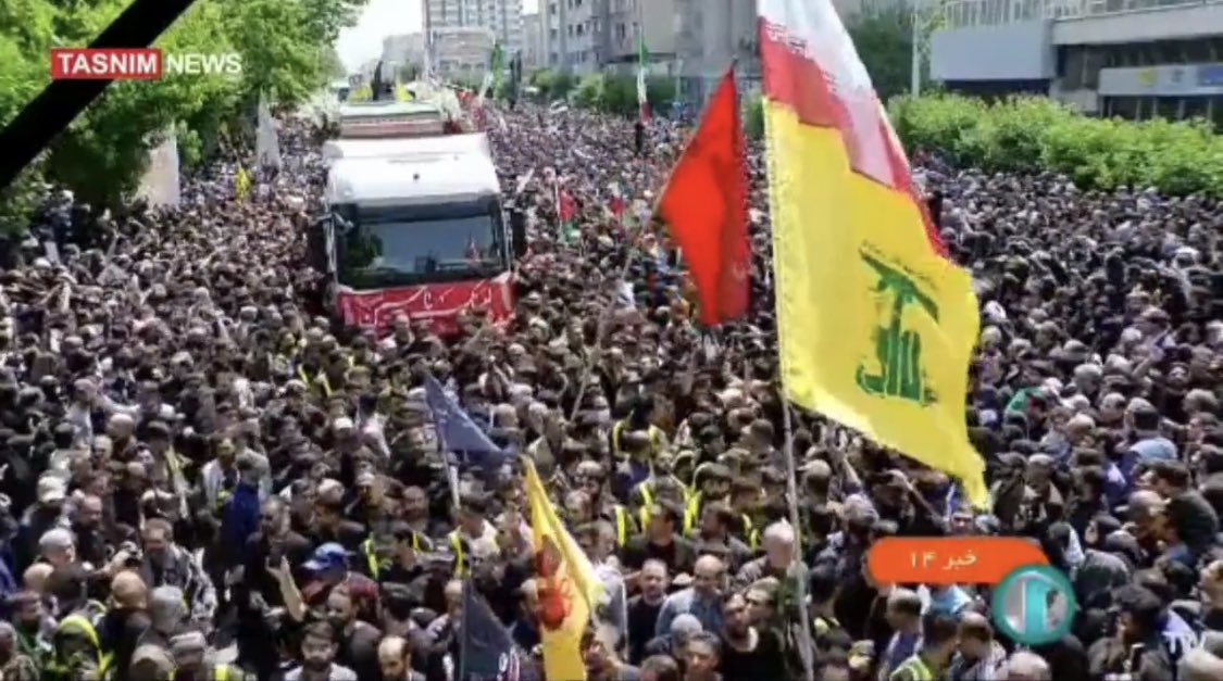 Flying the Hezbollah flag during the funeral of President Raisi and his companions