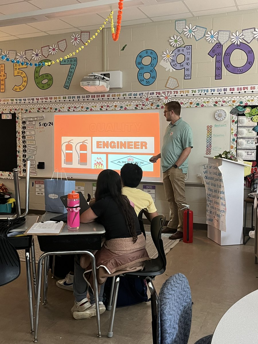 Amerex_Corp's tweet photo. We love connecting with our community. Recently, Erik Witte, an Amerex Quality Engineer, spoke with students at @PelhamRidge_ES during their Career Day. This school has an Amerex unit in each classroom, so the kids instantly recognize the Amerex diamond. #careerday #amerexcareers https://t.co/FF9TNyP81p
