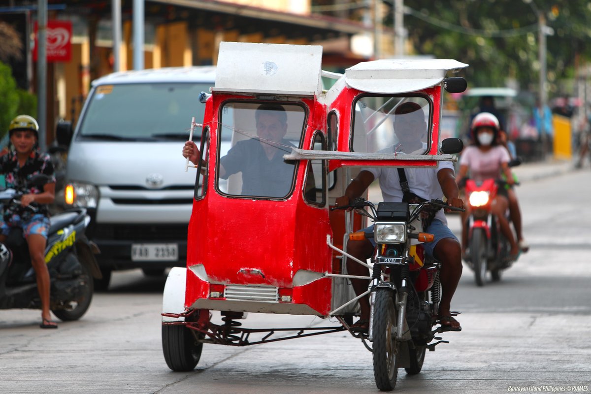 Island Life Therapy: Basic tricycle transportation is a nice, quick way to get around to run errands:  Bantayan Island Cebu, The Philippines. #ThePhotoHour #travelphotography #IslandLife #bantayanisland #bantayan #photography #EOS #StormHour #ShotOnCanon #Cebu #motorcycles