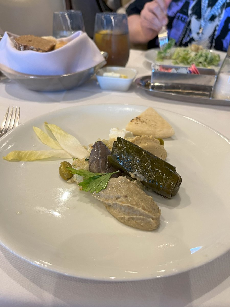 Pic of the day! (Taken 4/8/24) - my first Holland America food pic. (I forgot to take them so many times. LOL.) A Greek-themed appetizer. Yum. (My non-adventurous hubby is having Ceasar Salad :P ) #authoronvcation #HollanAmerica