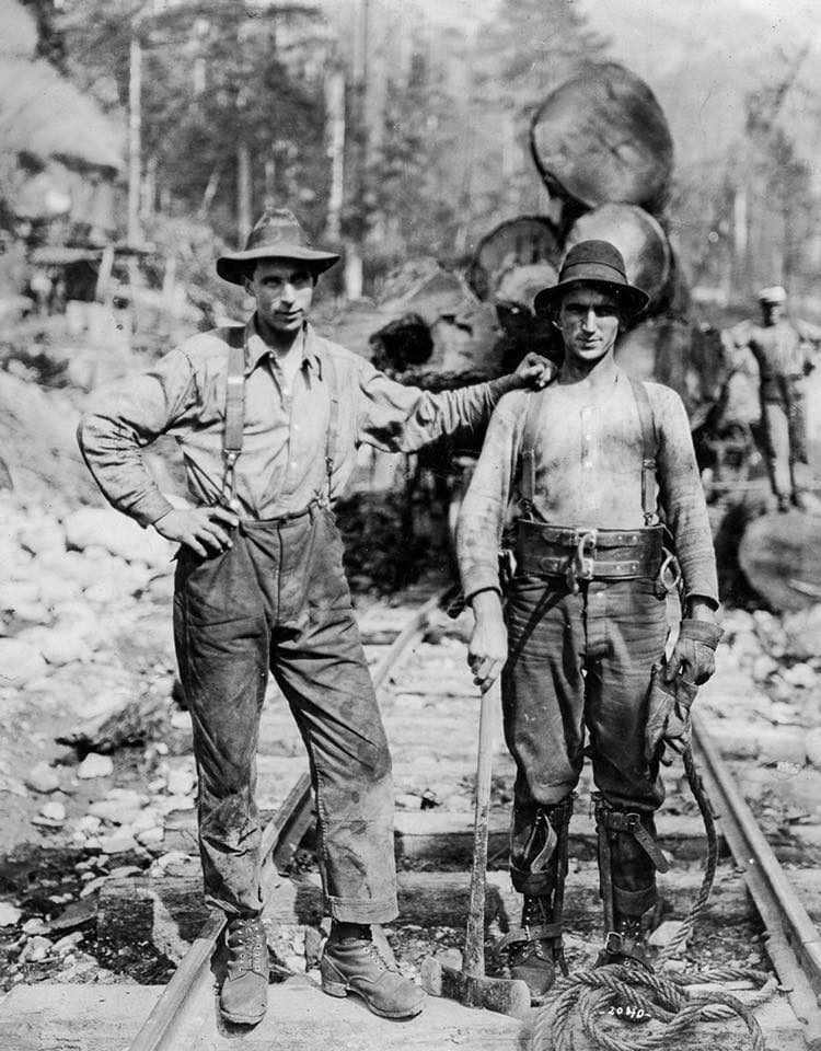 2 lumberjacks, 104 years ago. 💪 ' Lots of hard work. It's amazing to see what it looked like 100 years ago. '