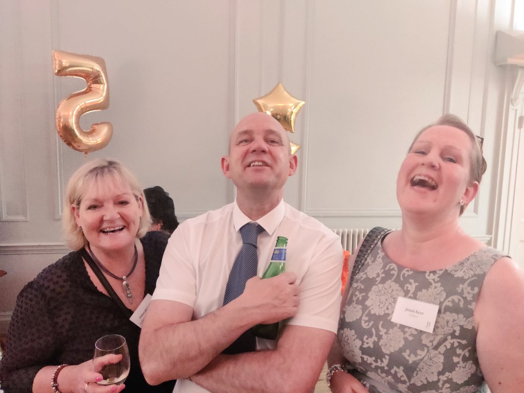 My amazement that the table decorations at @BoldwoodBooks party WERE EDIBLE!!!! Happy 5th birthday to my publisher 🎉🍾🎉🍾🎉 Here's @greenwoodross and @DebsCarr embracing the celebrations with me.