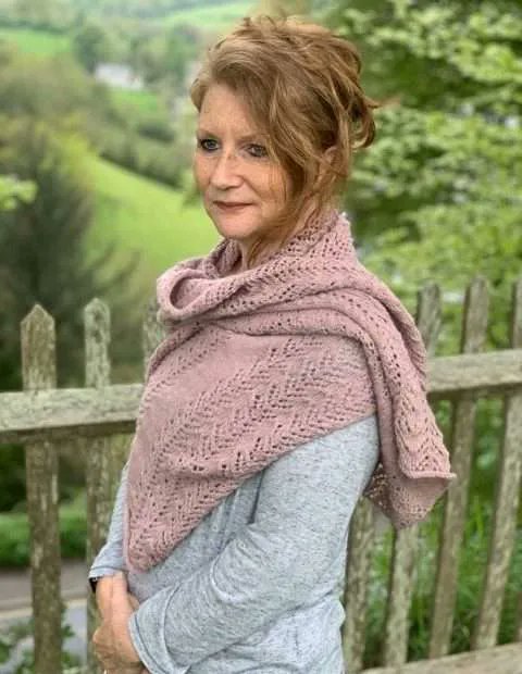 Here's Lizzie of @nelihandmadedesigns pictured with some of our yarns during a planning meeting at our mill and modelling a summer shawl that she designed. 'I really love working with the BY team, the staff are both helpful and friendly.' #blackeryarns #handknitting #summershawl