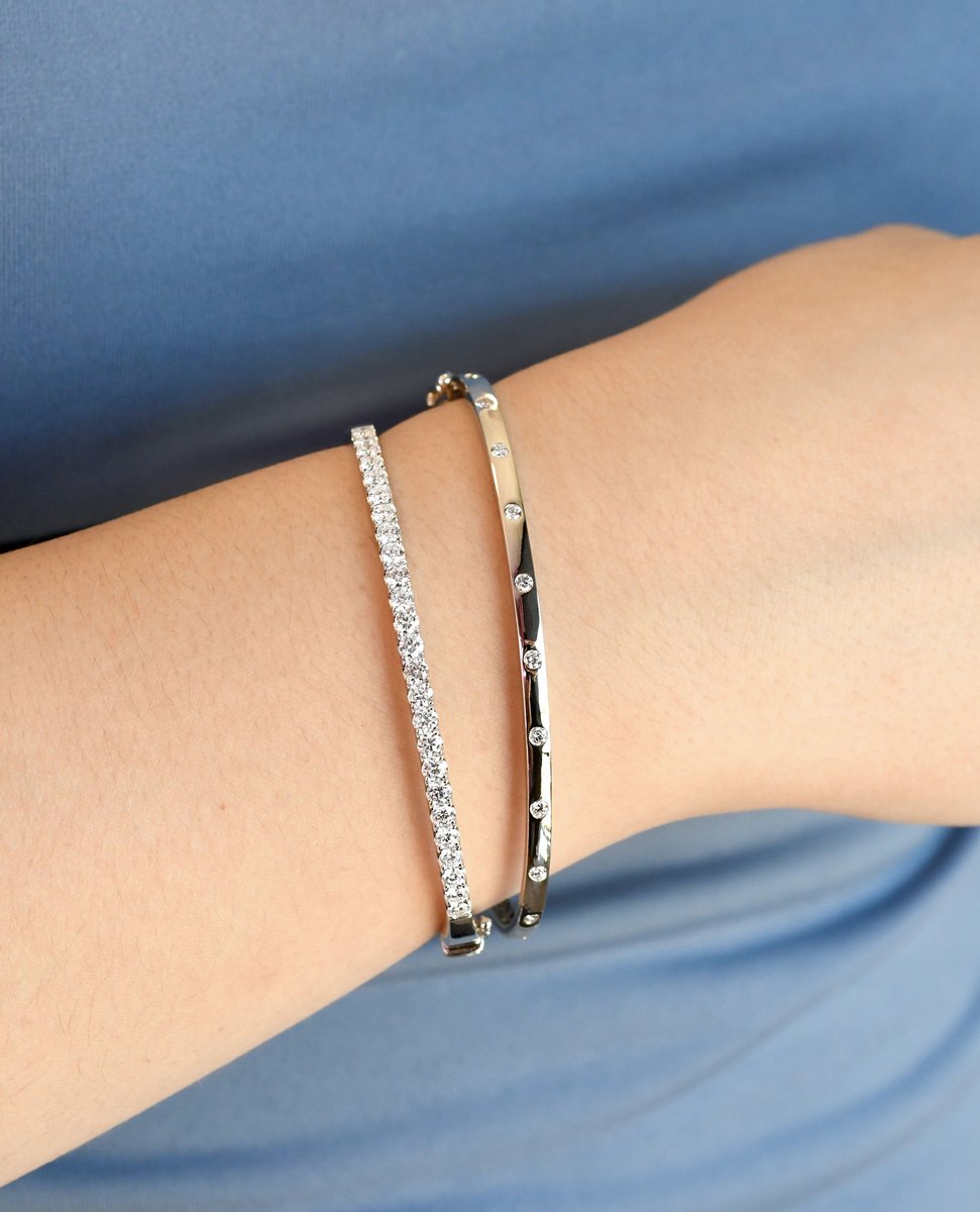 Start your day right with a touch of sparkle! ✨Our diamond bangle bracelets make every day a fabulous one. ☀
.
.
#PaulBenselJewelers #ShopLocalYuma #YumasBest #YumaAz #Diamonds #Jewelry #Bracelets #Accessories #GreatDay #ExplorePage #Trendy #Luxury