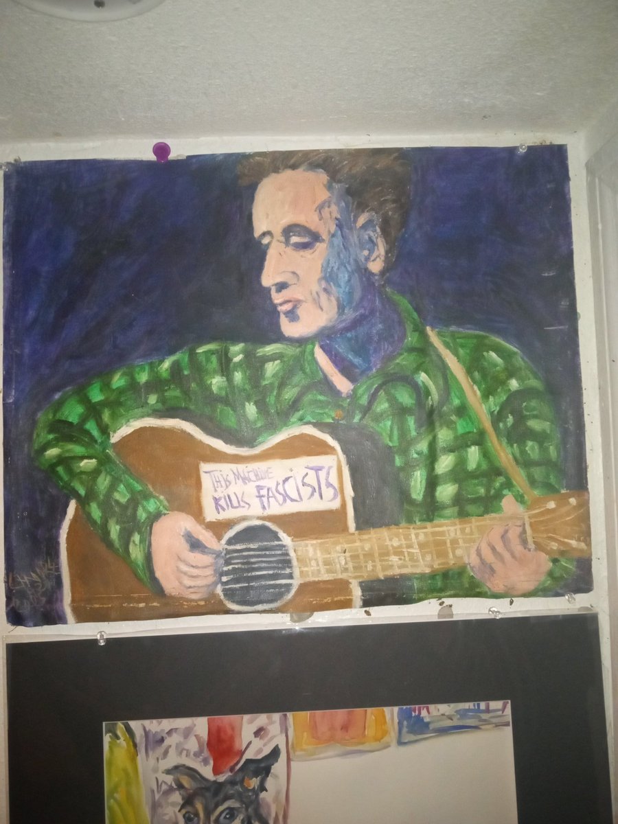Guitars are frequent theme in my work the one what he looks a lot angrier because there's a lot more fascism to fight as it was painted this year and the other one was painted 20 years ago can't wait to do Jerry as the old guitar player
