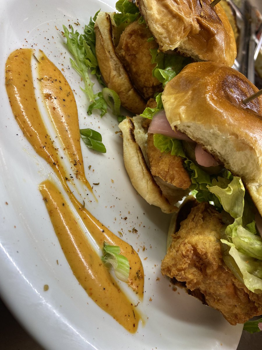 Fried salmon belly sliders with a blackened aioli sauce