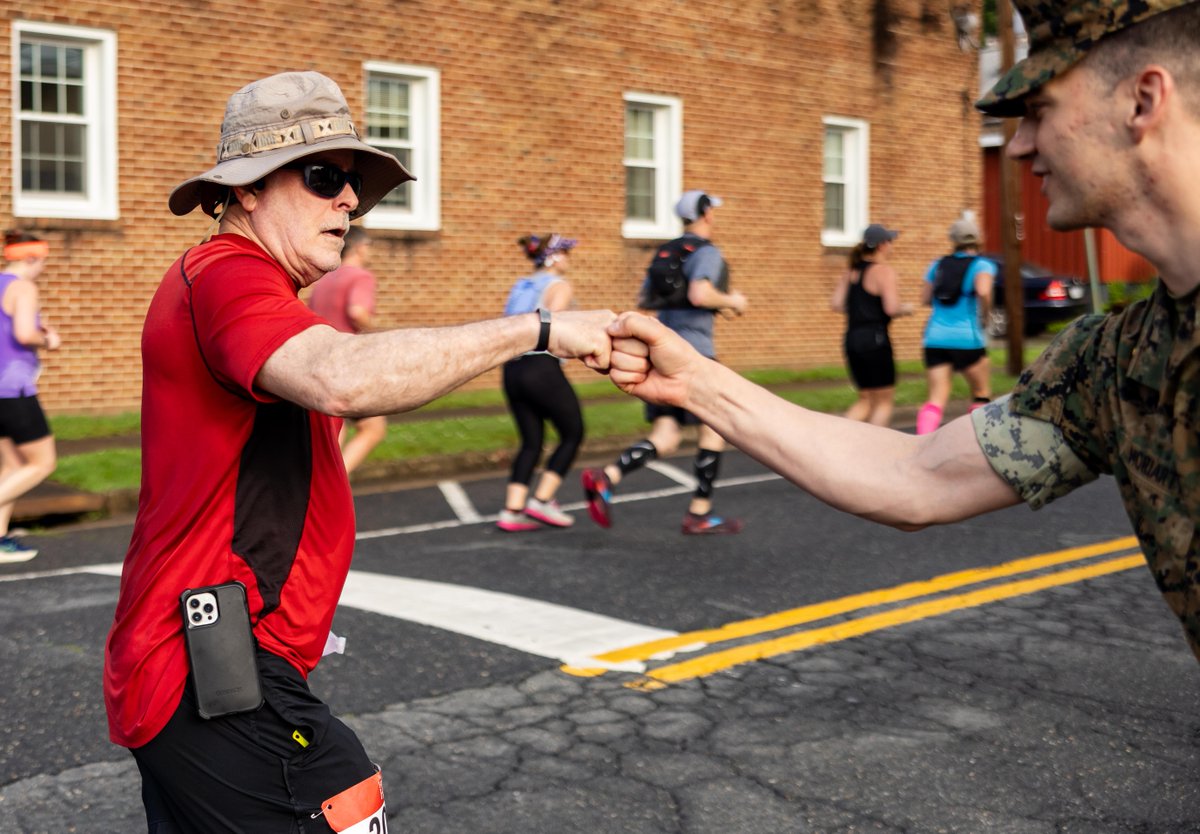 Keeping up the motivation. Marines hand out water & cheer on participants of the 17th annual @USMC Historic Half in Fredericksburg, Va. The 13.1-mile race generates community goodwill while emphasizing the Marine Corps’ warrior ethos.