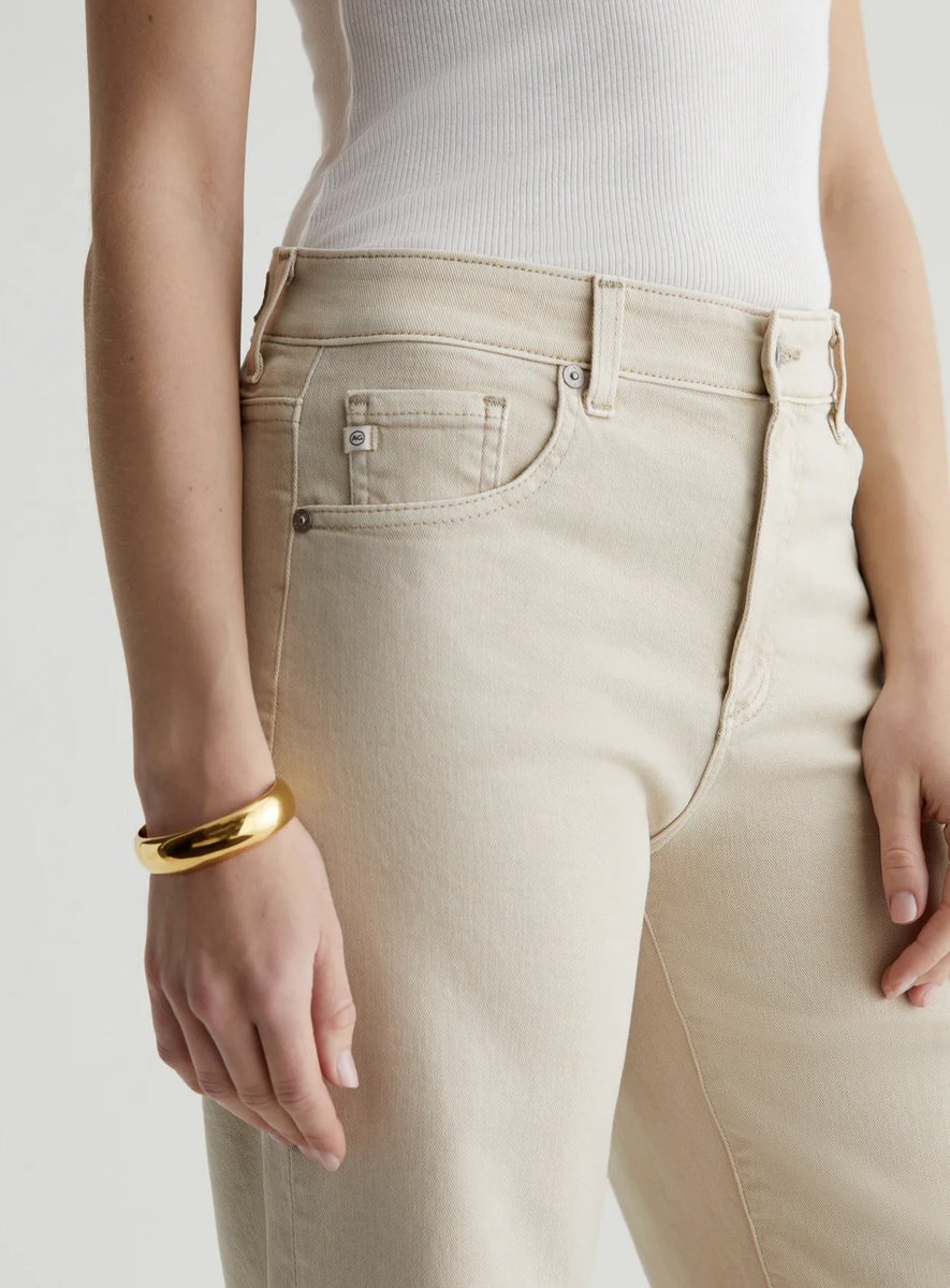 This Saige wide leg crop is a high rise denim with a raw edge hem. AG cloud soft denim gets softer with every wear.  Sulpher dyed a pale beige. #AGdenim #springstyle #yycfashion #oconnors #yycstyle #springdenim #shoplocalyyc