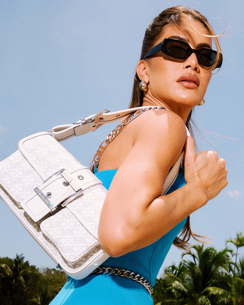 Blue crush. Miami local #CamilaCoelho gives her resident seal of approval. #ClubKors Shop the edit at clubkors.us.