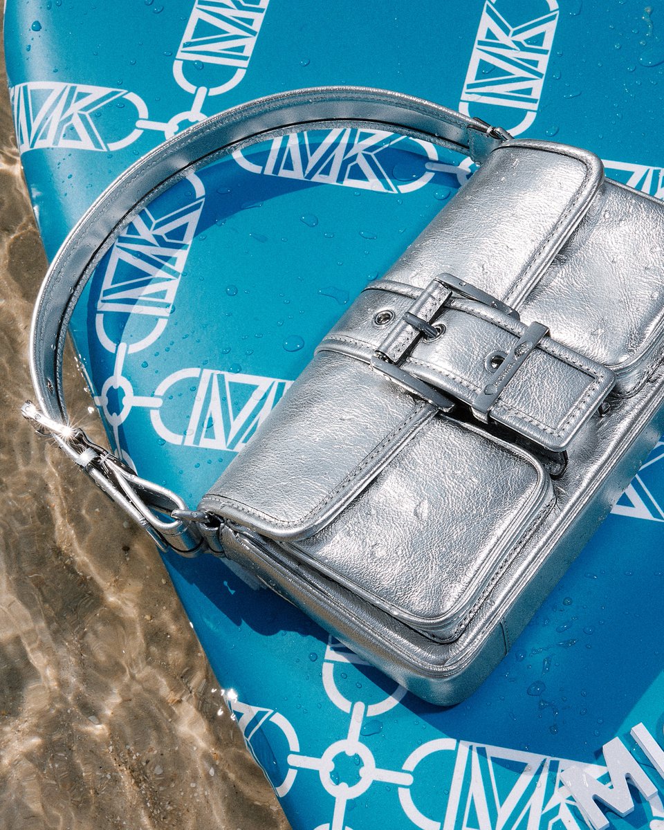 Surf’s up. The Colby bag makes waves in Miami at #ClubKors. michaelkors.com/colby-medium-m…